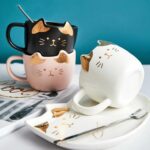 Cat gold keramička šolja s tacnom i kašikom
